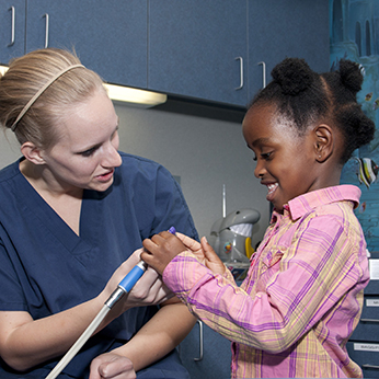 Child with doctor during exam